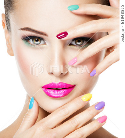 beautiful woman with multicolor nails and fashion beautiful woman with multicolor nails and fashion 61948855