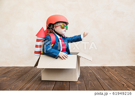 Happy child playing at home Happy child playing at home 61949216