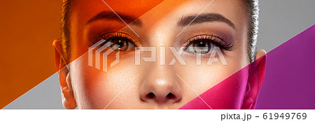 Beautiful white girl with bright eye-makeup. Beautiful white girl with bright eye-makeup. 61949769