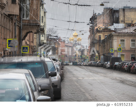Rain in the city. Spring rain in the old city Rain in the city. Spring rain in the old city 61955233