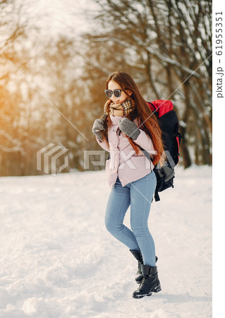 girl with backpack 61955351