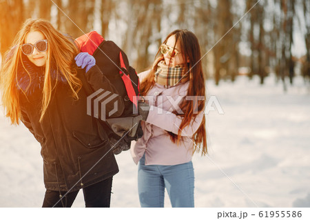 girls with backpack 61955586