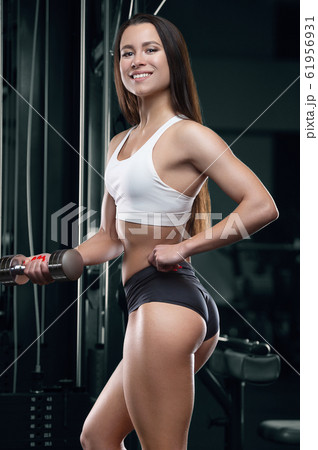 Fitness Woman Pumping Up Muscles Biceps And Triceps Workout