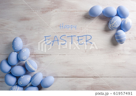 Background with Easter painted eggs and lettering 61957491