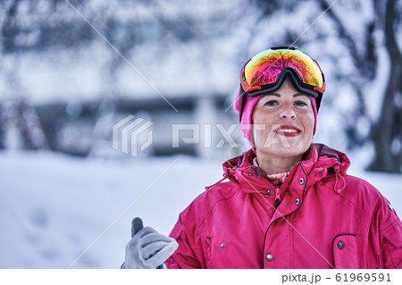 Portrait of a surfer woman in sportswear  61969591