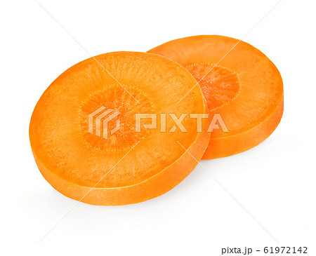 Carrot slices isolated close-up on white. Carrot slices isolated close-up on white. 61972142
