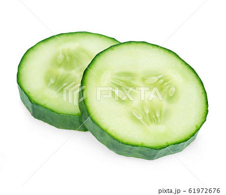 Fresh slice cucumber close-up on white. 61972676