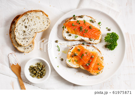 smoked salmon toast with cream cheese and pickle smoked salmon toast with cream cheese and pickle 61975871