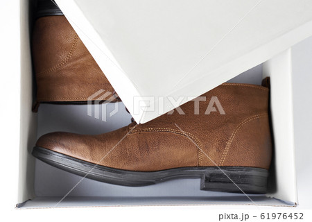 Pair of new brown leather womens boots in open box Pair of new brown leather womens boots in open box 61976452