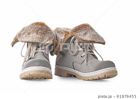 Pair of winter womens boots on the white 61976455