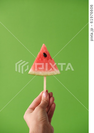 Watermelon on a wooden stick 61976606