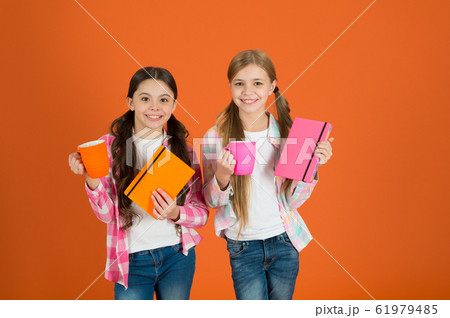 Reading pleasant activity. Girls kids with books 61979485