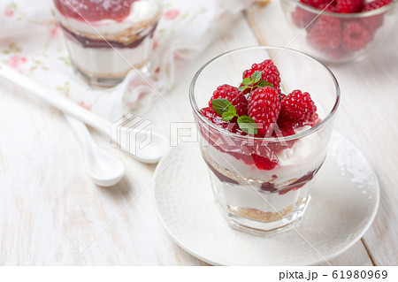 cheesecake with raspberries in glasses cheesecake with raspberries in glasses 61980969