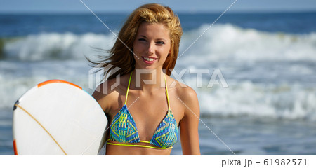 Beautiful Young Woman Surfer Girl in Bikini with 61982571