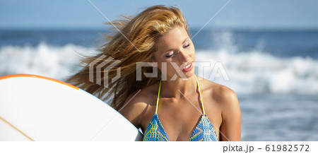 Beautiful Young Woman Surfer Girl in Bikini with 61982572