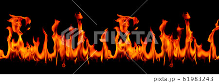 On fire flames at the black background, Burning red hot sparks rise 61983243