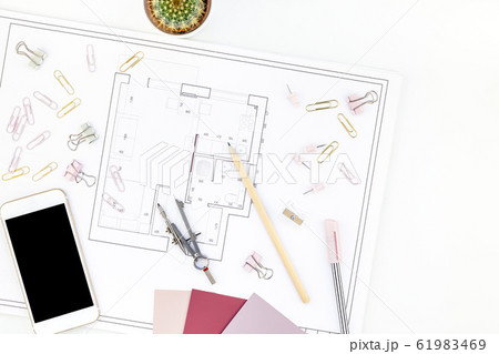 Interior designer table workplace with house plan Interior designer table workplace with house plan 61983469