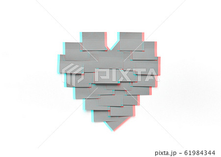 Blank pink sticky notes sticked on white wall in 61984344