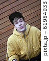 cocky guy spits and wrinkles his face portrait 61984933