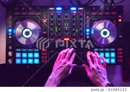 Dj mixes the track in the nightclub at a party 61985133