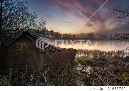 Misty morning at the Old Boat house 61985762