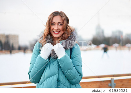 Beautiful lovely middle-aged girl with curly hair 61986521