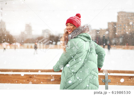 Beautiful lovely middle-aged girl with curly hair 61986530