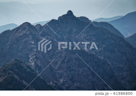 甲斐駒ヶ岳山頂から見る鋸岳稜線 61986800