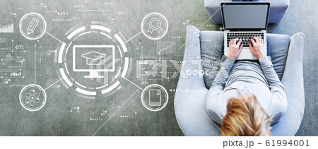 E-learning concept with man using a laptop E-learning concept with man using a laptop 61994001