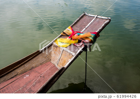 Colorful Satin tie at the prow of boat is worship 61994426