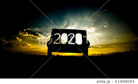 Silhouette of hands holding recycle cardboard with 61998093