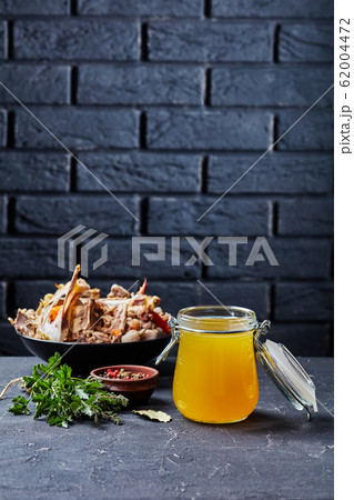 Chicken Stock in Clear Glass Jug Stock Photo by ©TravellingLight 203503932