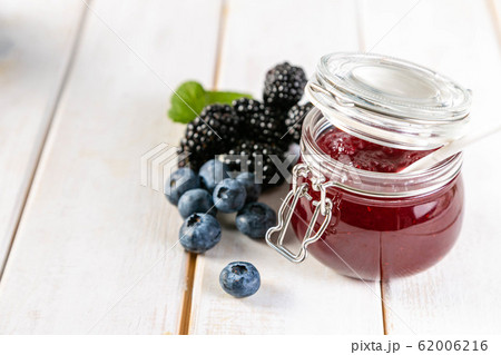 Selection of berry jams in glass jars Selection of berry jams in glass jars 62006216
