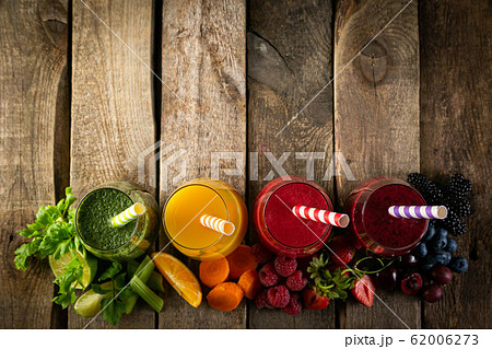 Selection of colorful smoothies in glasses Selection of colorful smoothies in glasses 62006273