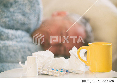 Mature man suffering from coronavirus, flu or cold Mature man suffering from coronavirus, flu or cold 62009320