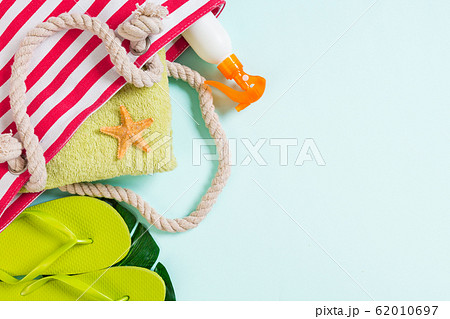 Summer bag background with copy space. Flat lay Summer bag background with copy space. Flat lay 62010697