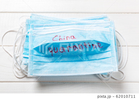 China quarantine word written on medical mask. China quarantine word written on medical mask. 62010711