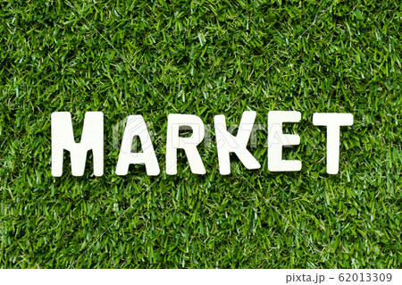 Alphabet letter in word market on artificial green grass 62013309
