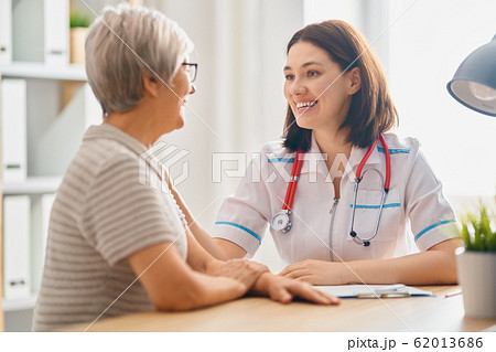 patient listening to doctor patient listening to doctor 62013686