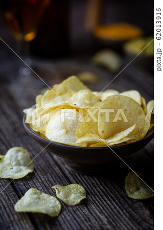 Crunchy delicious potato chips Crunchy delicious potato chips 62013916