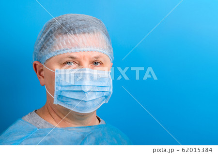Portrait of man wearing medical uniform and 62015384