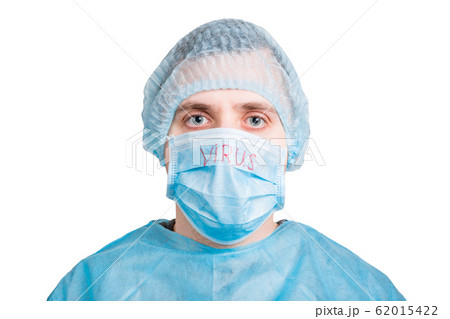 Portrait of handsome man wearing medical uniform Portrait of handsome man wearing medical uniform 62015422