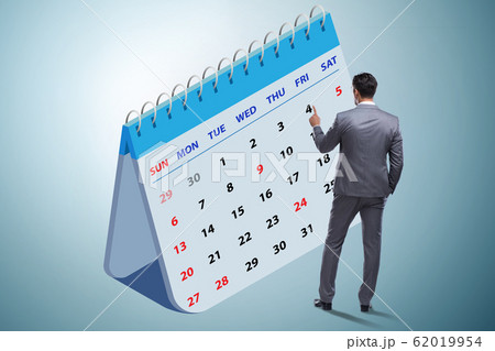 Business calendar concept with businessman Business calendar concept with businessman 62019954