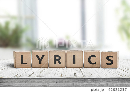 Lyrics sign on a table in a bright room 62021257