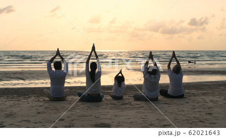 Holiday concept. A large family practicing yoga 62021643