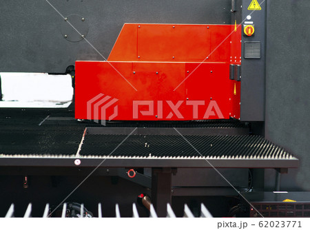 Sheet of metal and hands of worker who works on Sheet of metal and hands of worker who works on 62023771