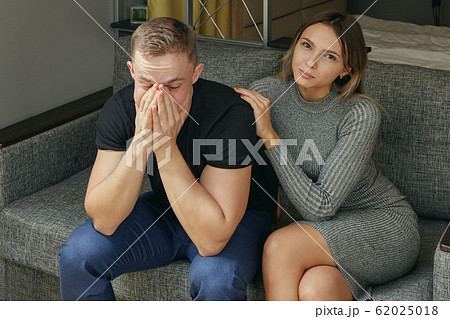 Young man with not getting enough sleep and girl. 62025018