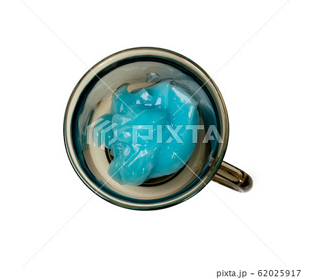 Blue slime in cup isolated on white background top 62025917