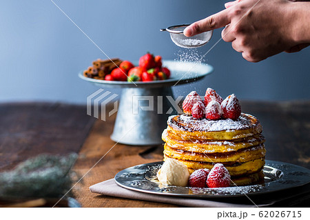 Strawberry pancakes with maple syrup 62026715