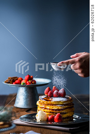 Strawberry pancakes with maple syrup Strawberry pancakes with maple syrup 62026718